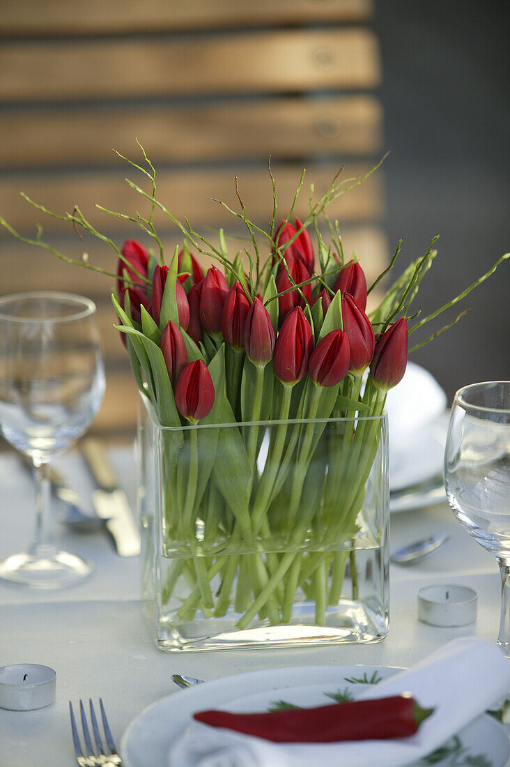Flower vase with tulips on a table
