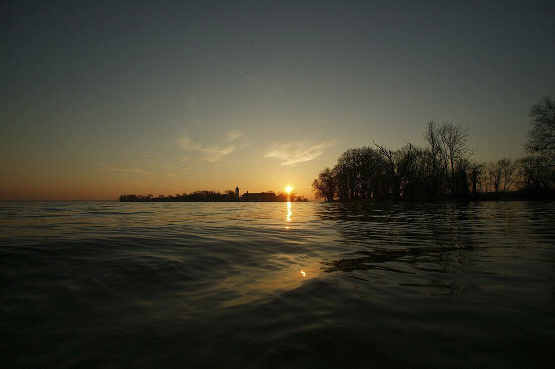 Sunrise over Fraueninsel island, Lake Chiemsee, Chiemgau, Bavaria, Germany