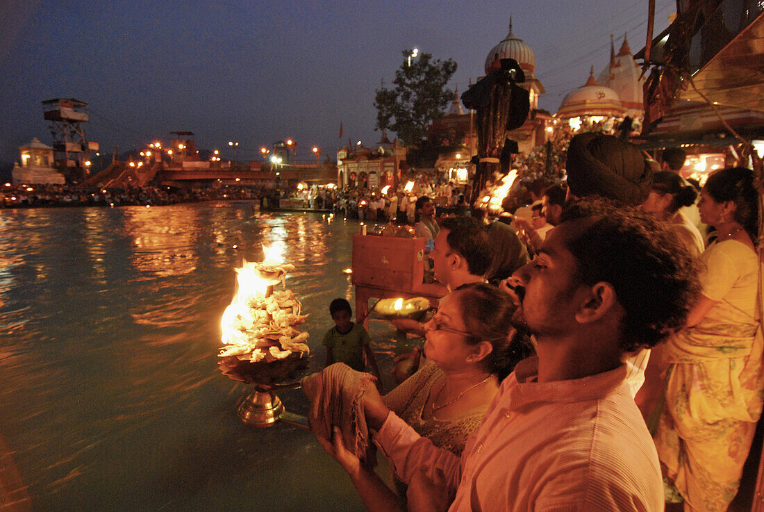 Aarthi fire ceremony, people at Hari Ki Pairi Ghat river in the evening, Haridwar, Uttarakhand, India, Asia