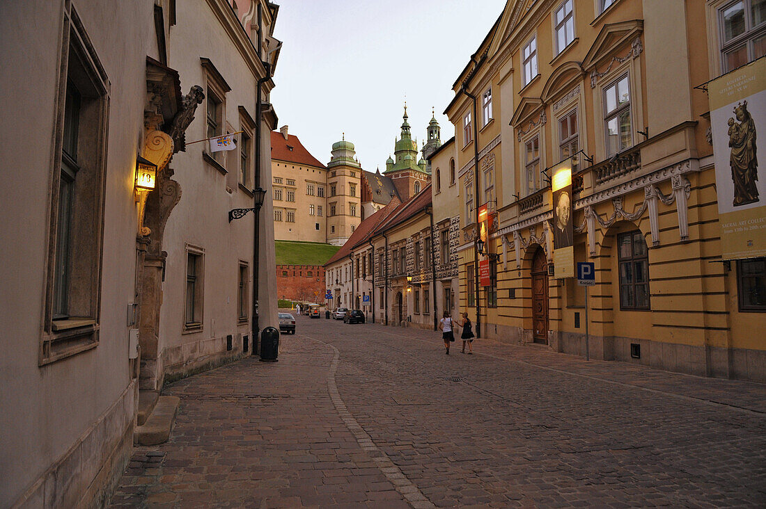 Ulica Kanonicza at dusk, view towards Wawel, Krakow, Poland, Europe