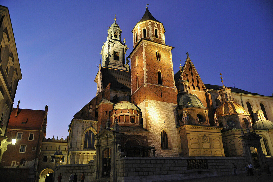 The illuminated Wawel cathedral in the evening, Krakow, Poland, Europe