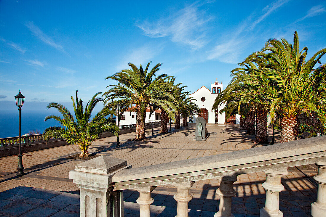 Church behind palm trees in the sunlight, Santo Domingo de Garafia, La Palma, Canary Islands, Spain, Europe