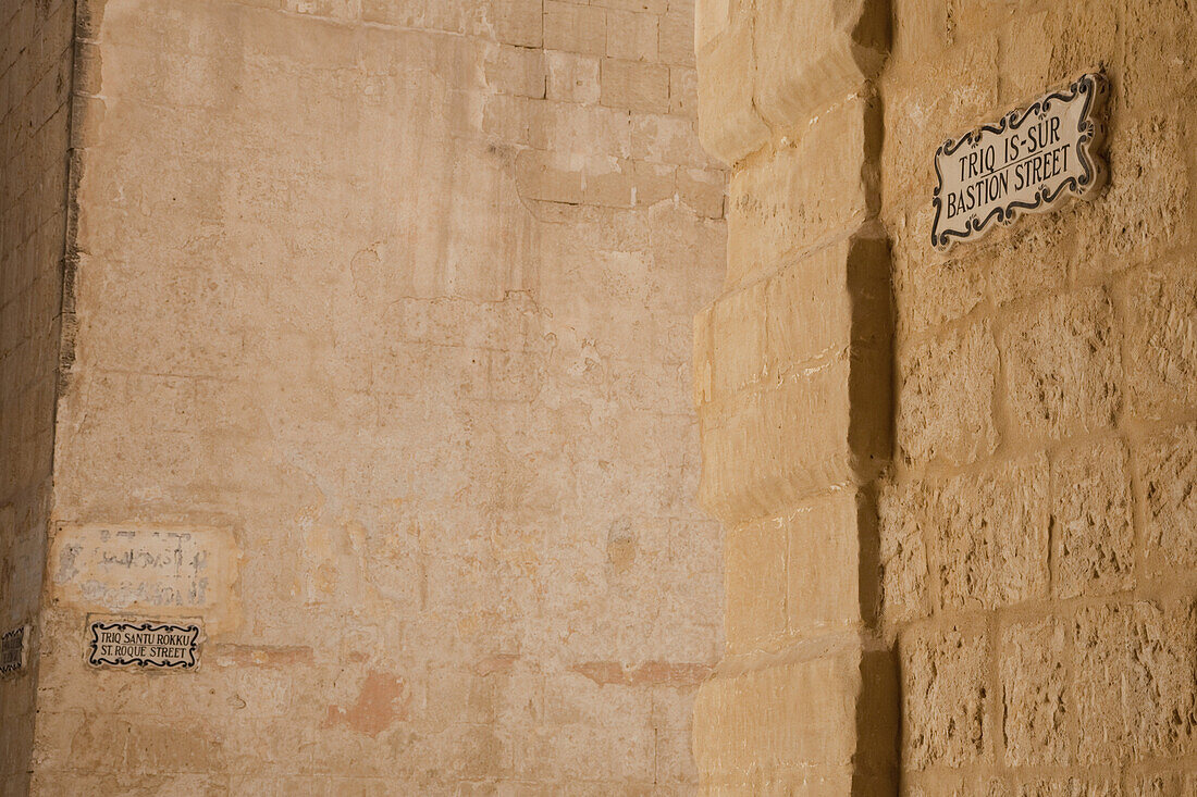 Street signs on a wall, Mdina, Malta, Europe