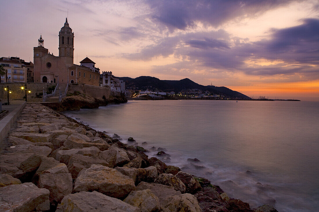 The cathedral La Punta on the waterfront at sunrise, Sitges, Catalonia, Spain, Europe