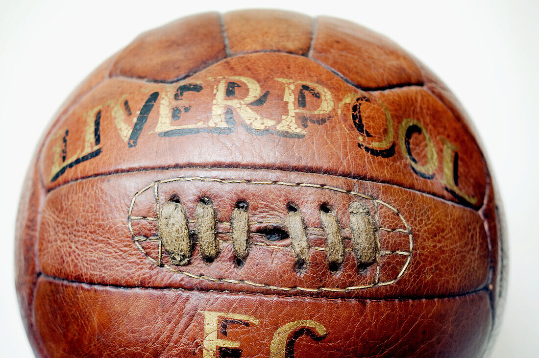 Aged, Ball, Balls, Clipping path, Close-up, Closeup, Color, Colour, Football, Horizontal, Inscription, Inscriptions, Liverpool FC, Object, Objects, Old, Old fashioned, Old-fashioned, One, One item, Single item, Soccer, Sport, Sports, Still life, Studio sh