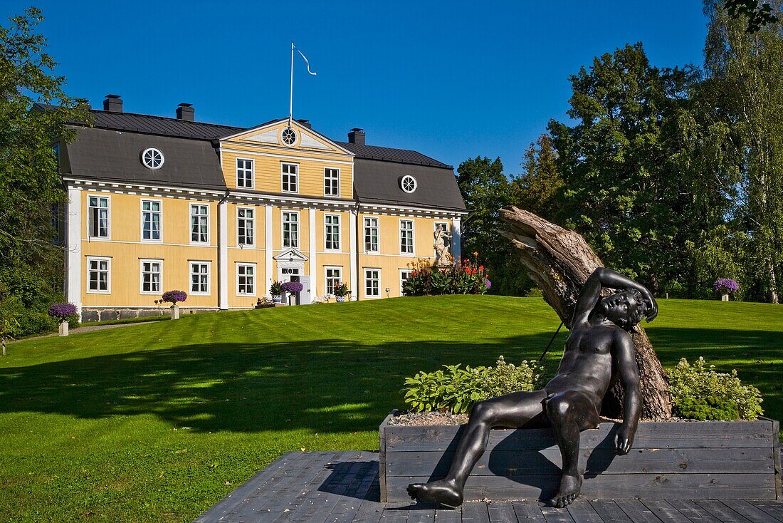 Finland, Southern Finland, Sovande Faun sculpture at the neoclassical Mustio Manor, built in 1783 - 1792