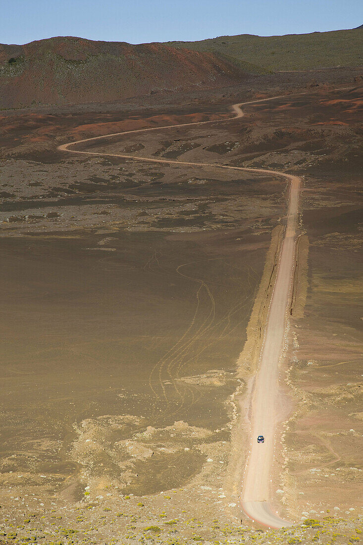 Ash plain road to the Piton de la Fournaise volcano, Plaine des Sables, Bourg-Murat, Reunion island, France