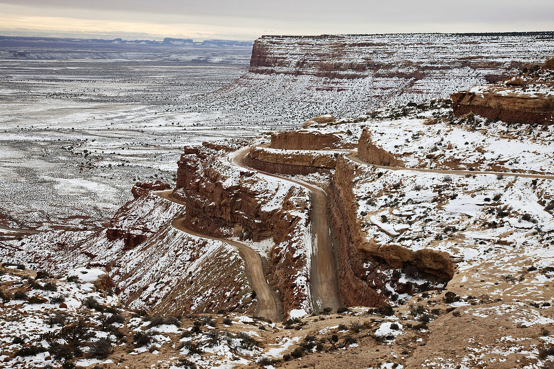 Dirt road switchbacks in winter, Moki Dugway, Utah, USA