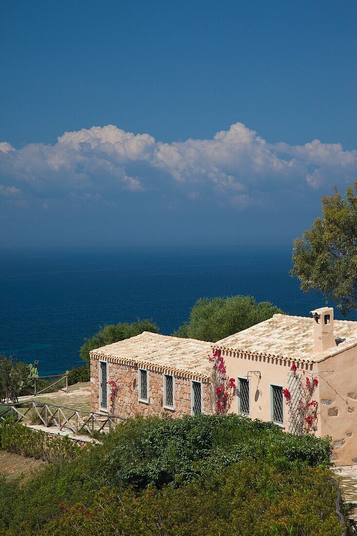 Italy, Sardinia, Sarrabus area, Capitana, cliff side house