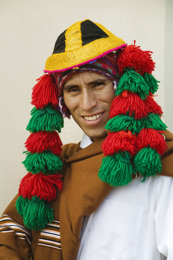 Man wearing typical costume of the Cusco region, Peru