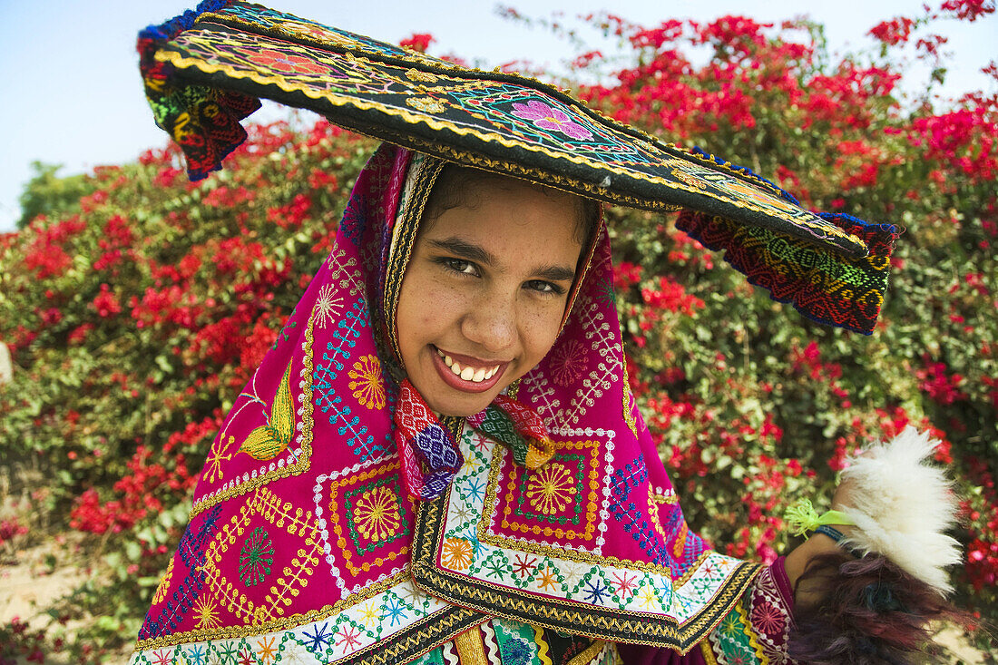 Girl wearing typical dress of the Cusco region, Peru