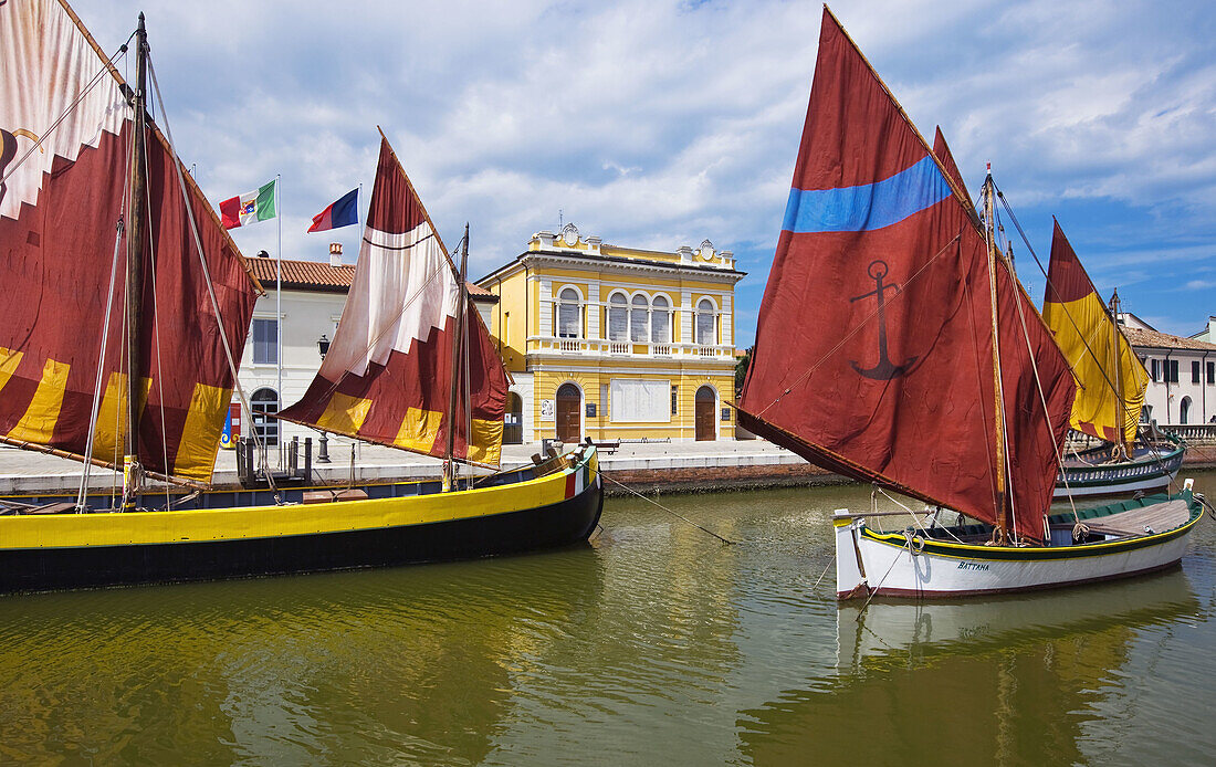 Historic fishing boats displayed in the port-channel, Marine Museum  Museo della Marineria), Cesenatico. Emilia-Romagna, Italy