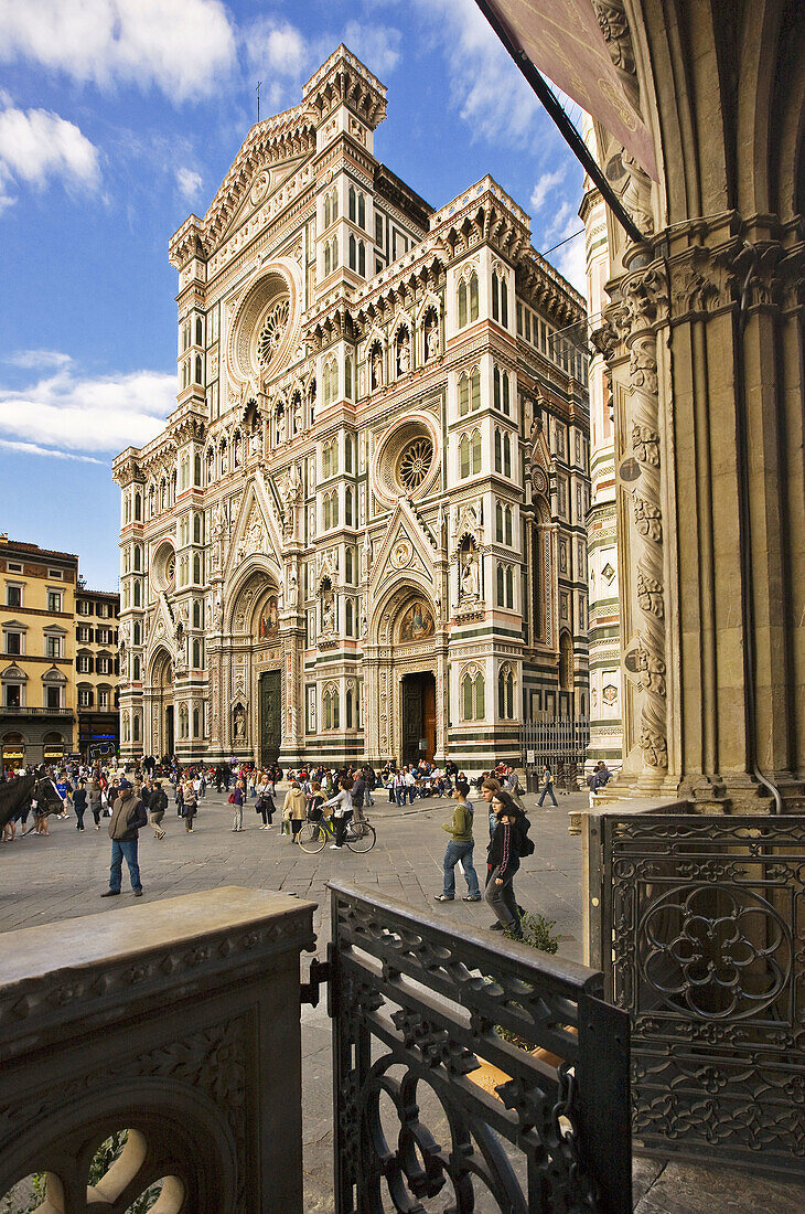 Façade of Santa Maria del Fiore cathedral from the Loggia del Bigallo, Florence. Tuscany, Italy