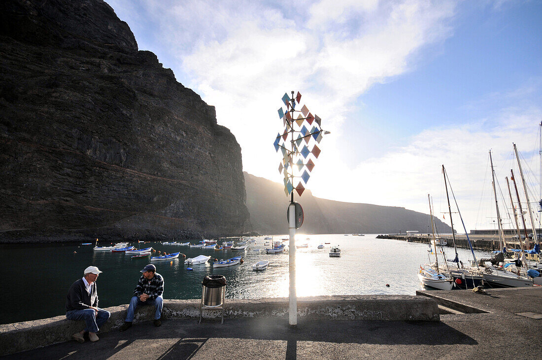 Two men at the pier, Vueltas at Valle Gran Rey, Gomera, Canary Isles, Spain, Europe