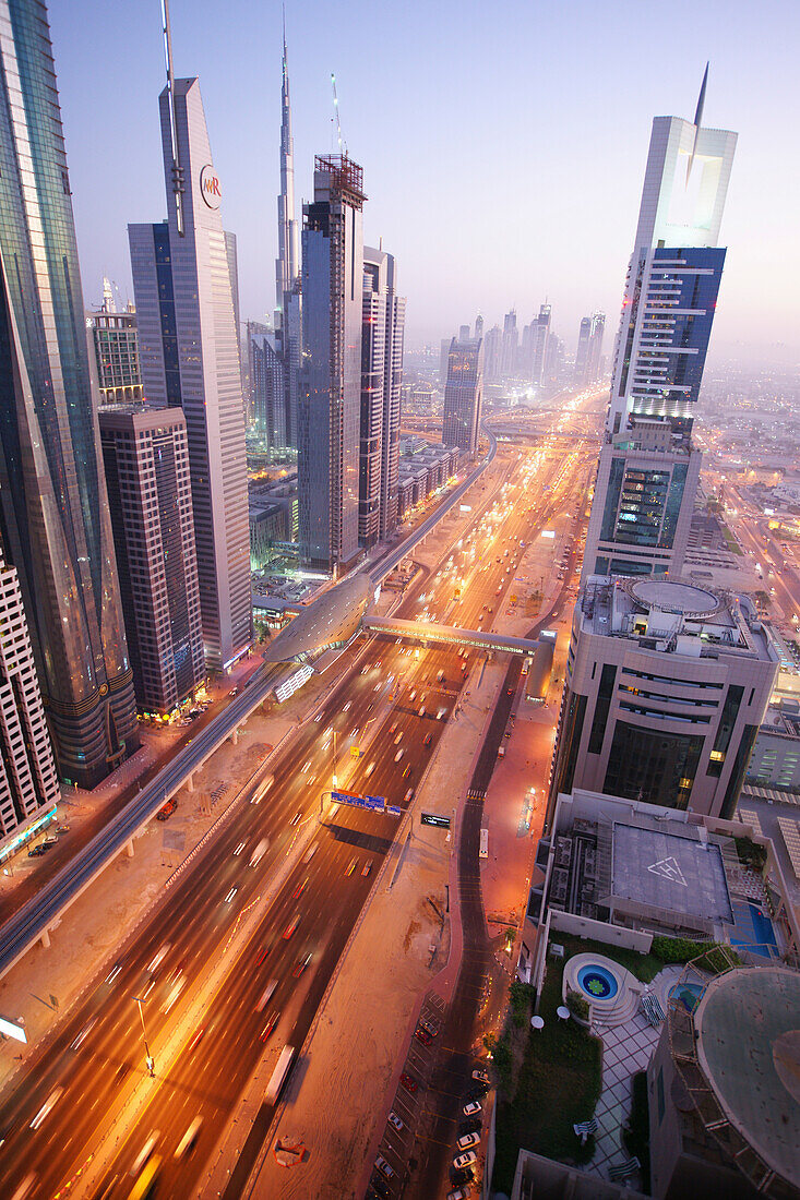 High rise buildings along Sheikh Zayed Road in the evening, Dubai, UAE, United Arab Emirates, Middle East, Asia