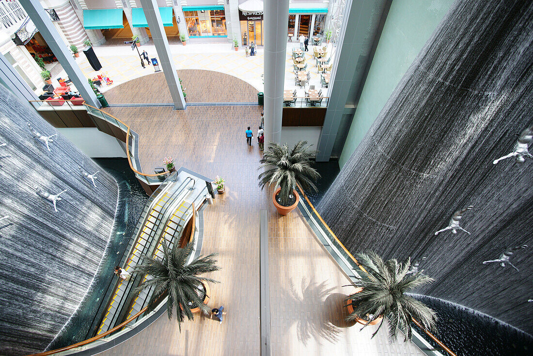 Giant waterfall with sculptures inside Dubai Shopping Mall, Dubai, UAE, United Arab Emirates, Middle East, Asia