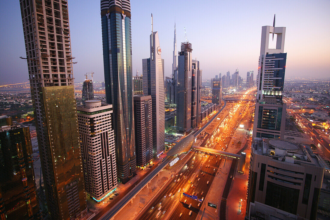 High rise buildings along Sheikh Zayed Road in the evening, Dubai, UAE, United Arab Emirates, Middle East, Asia