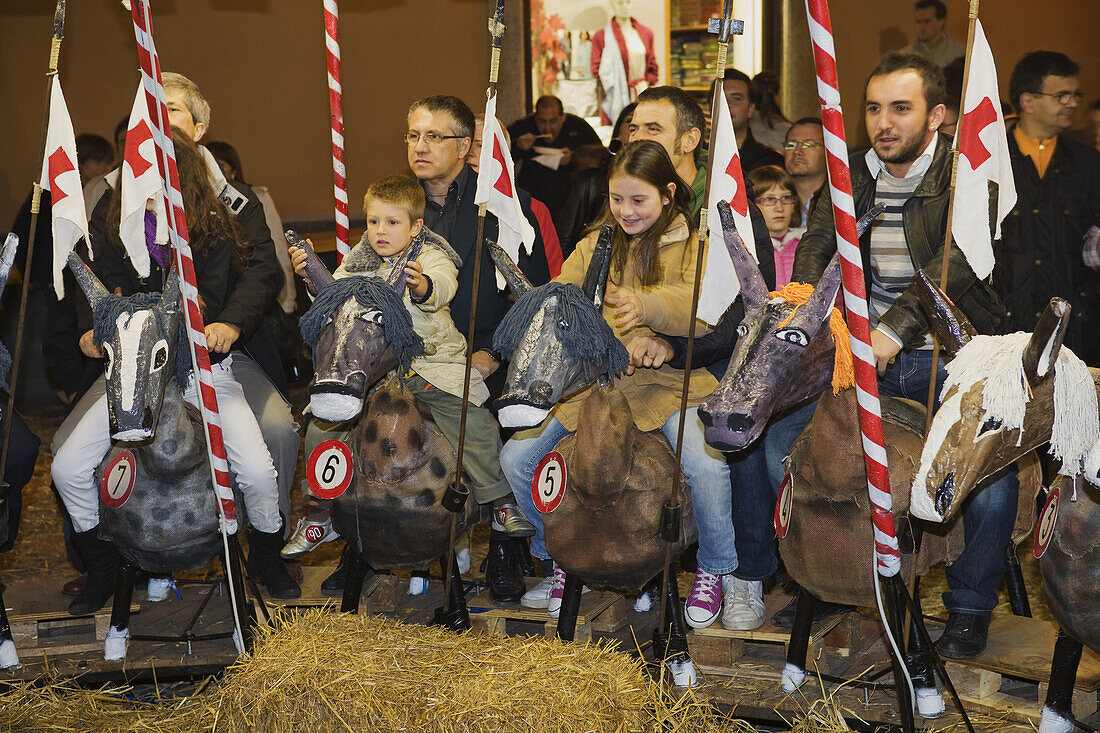 Donkey-riding competion during the Palio di Alba, Piazza Risorgimento, Alba, Piedmont, Italy