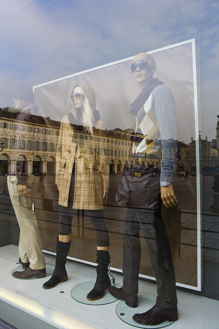 Shop window with reflection, Shopping in Via Roma, Turin, Piedmont, Italy