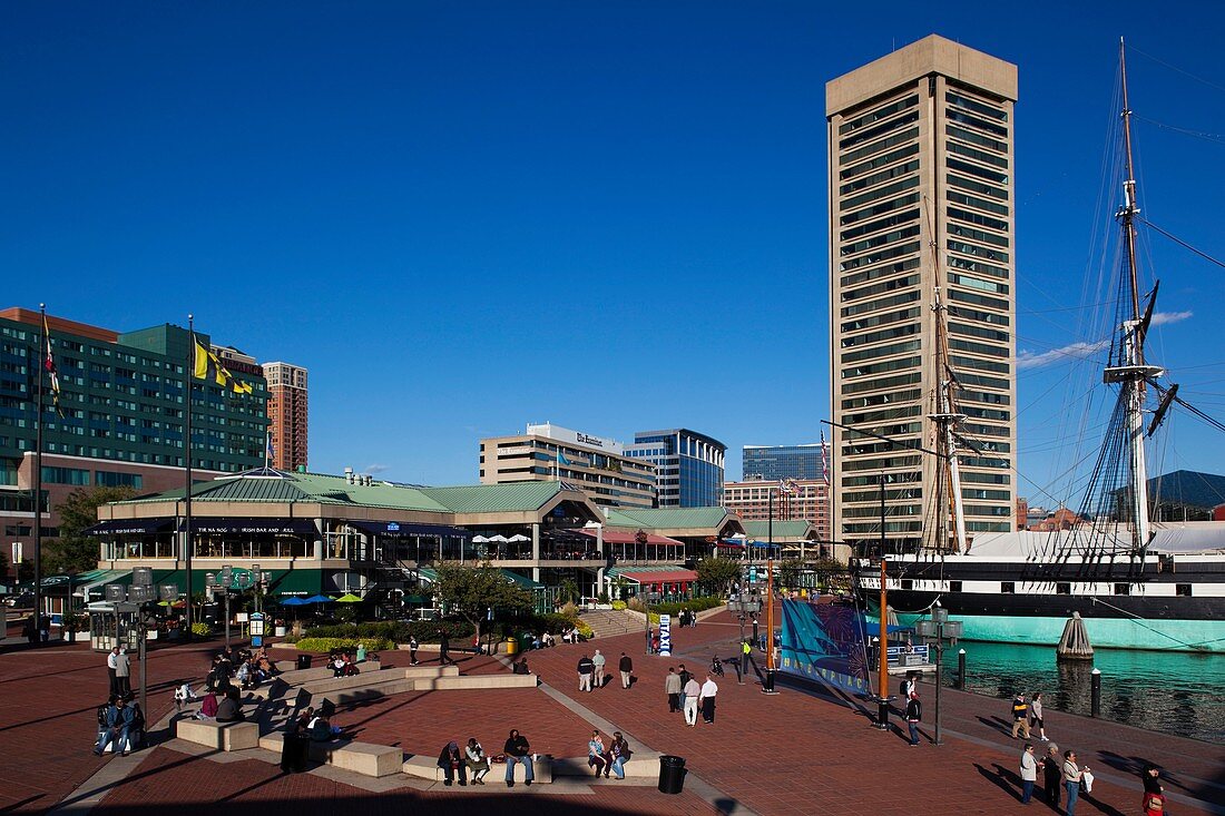 USA, Maryland, Baltimore, Inner Harbor, Harborplace Mall and USS Constellation, historic ship