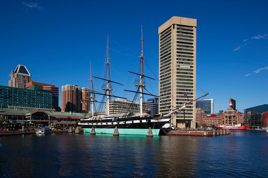 USA, Maryland, Baltimore, Inner Harbor, Harborplace Mall and USS Constellation, historic ship