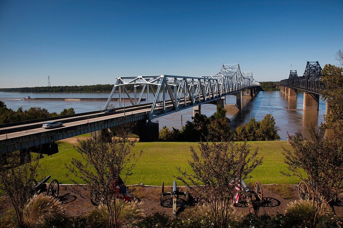 USA, Mississippi, Vicksburg, I-20 Highway and US-80 bridges across the Mississippi River with river barge traffic