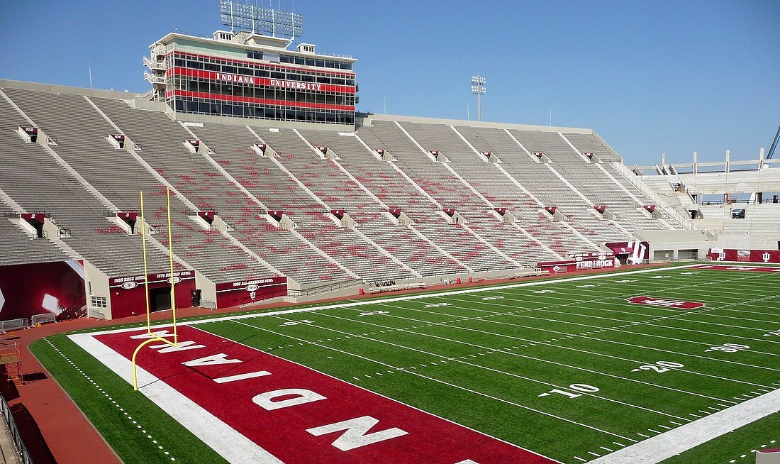 bleachers and field at Indiana University´s Memorial Stadium in Bloomington, empty, construction crane visible at one end
