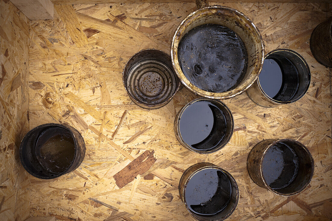 Cans of pitch for Maypole climbing, Zell an der Pram, Upper Austria, Austria