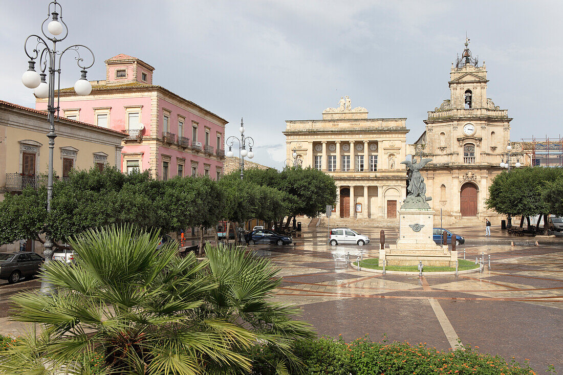 Buildings at square Piazza del Popolo under clouded sky, Vittoria, Province Ragusa, Sicily, Italy, Europe