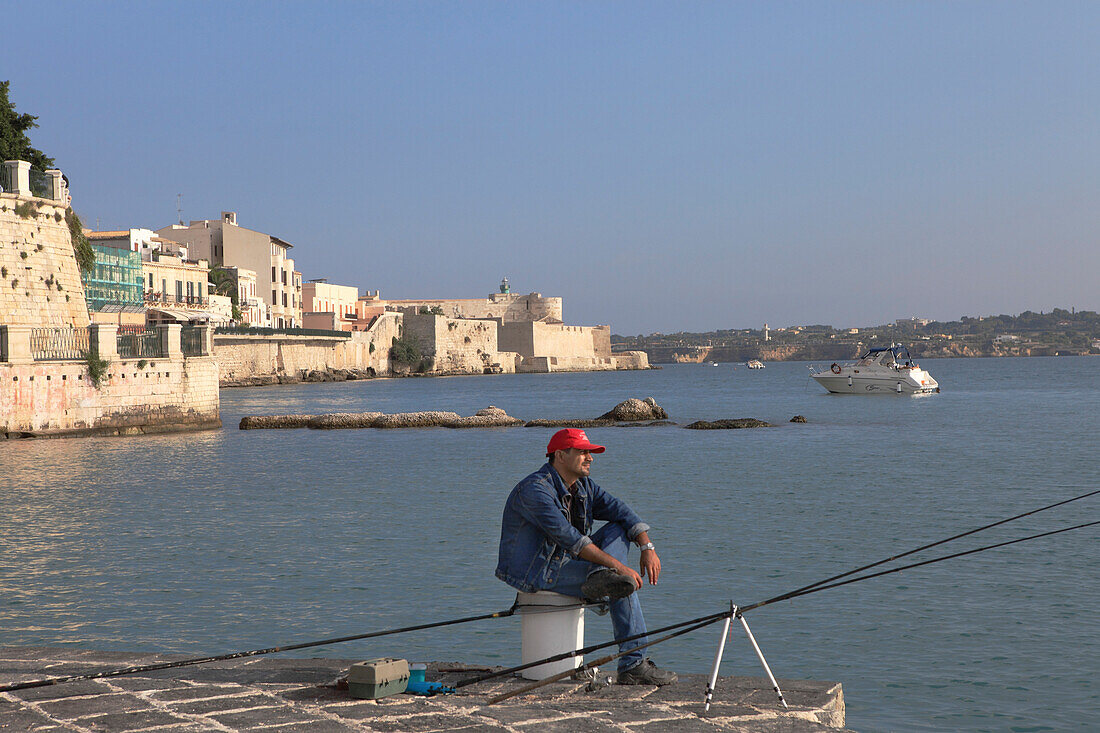 Angler on the pier at Syracuse on the Ortygia Island, Unesco World Heritage, Province Syracuse, Sicily, Italy, Europe