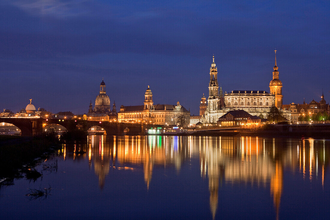 City view with Elbe River, Augustus Bridge, Lipsius building, Frauenkirche, Church of our Lady, Ständehaus, town hall tower, Hofkirche and Hausmannsturm tower of Dresden Castle, Dresden, Saxony, Germany