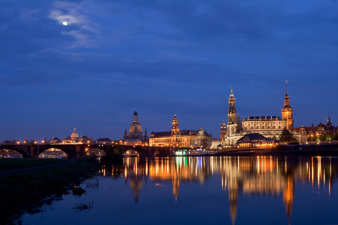 City view with the Elbe River and moon, Augustus Bridge, Frauenkirche, Church of our Lady, Ständehaus, town hall tower, Hofkirche and Hausmanns tower, tower of Dresden Castle, Dresden, Saxony, Germany