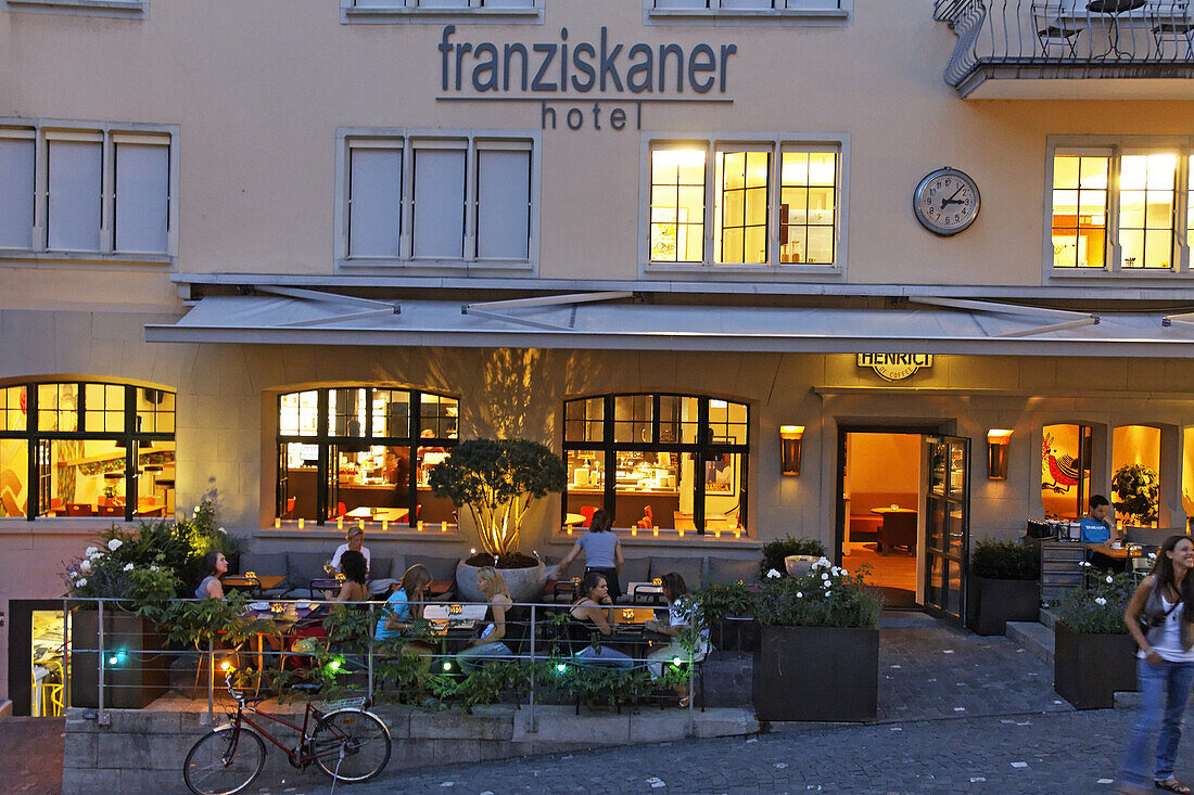 Franziskaner Hotel outdoor in Niederdorf, people, restaurants in summer, Switzerland, Zurich