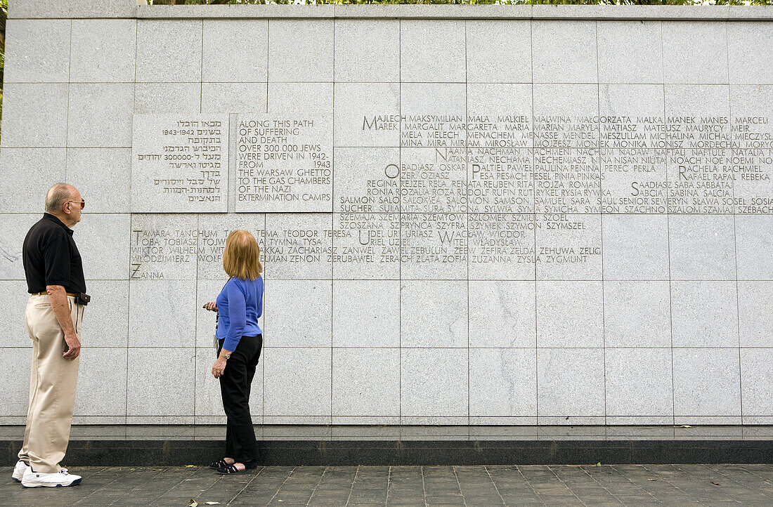 Tourists at Umschlagplatz in the Warsaw Ghetto, Warsaw, Poland, Europe