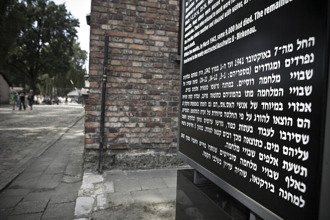 Information sign in Polish, English and Hebrew, Auschwitz Concentration Camp, Oswiecim, Poland, Europe