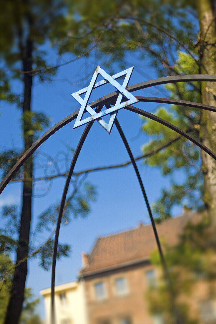 Jewish Star in courtyard on Szeroka in Jewish Kazimierz Quarter, Krakow, Poland, Europe