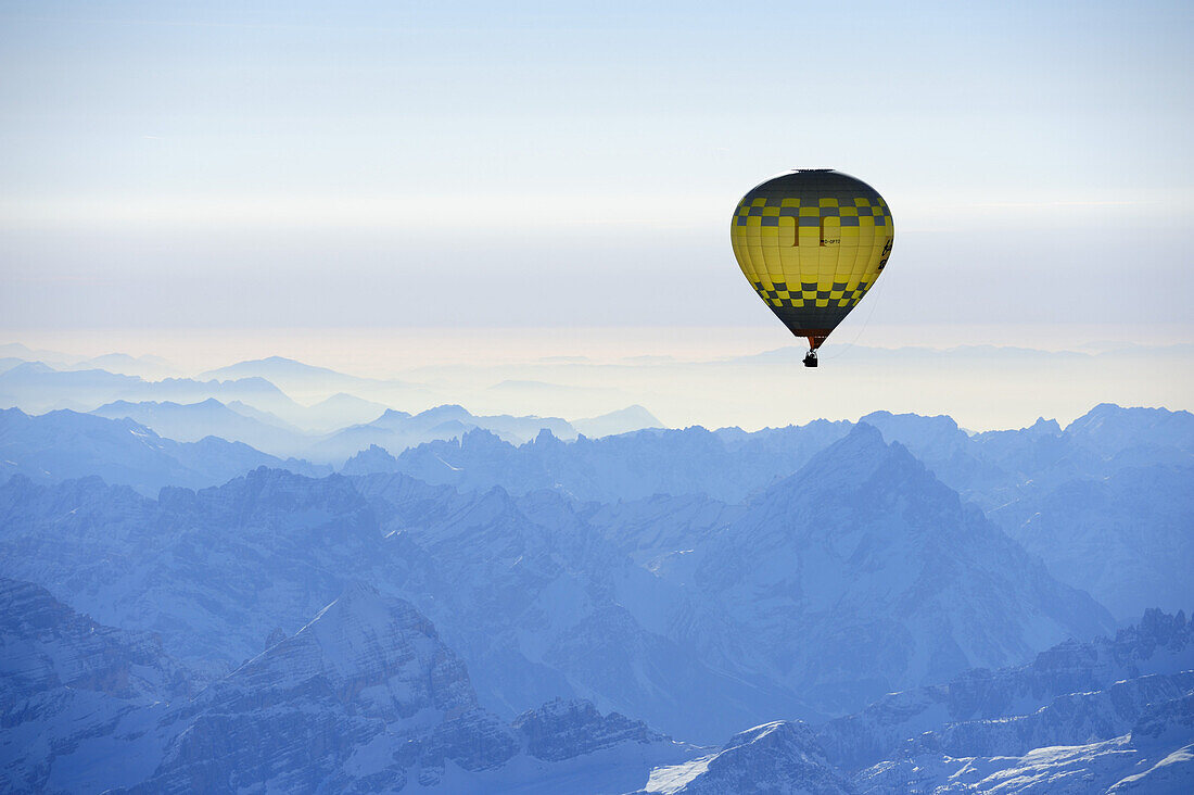 Hot-air balloon flying above Dolomites with Tofana and Antelao, aerial photo, Dolomites, South Tyrol, Italy, Europe