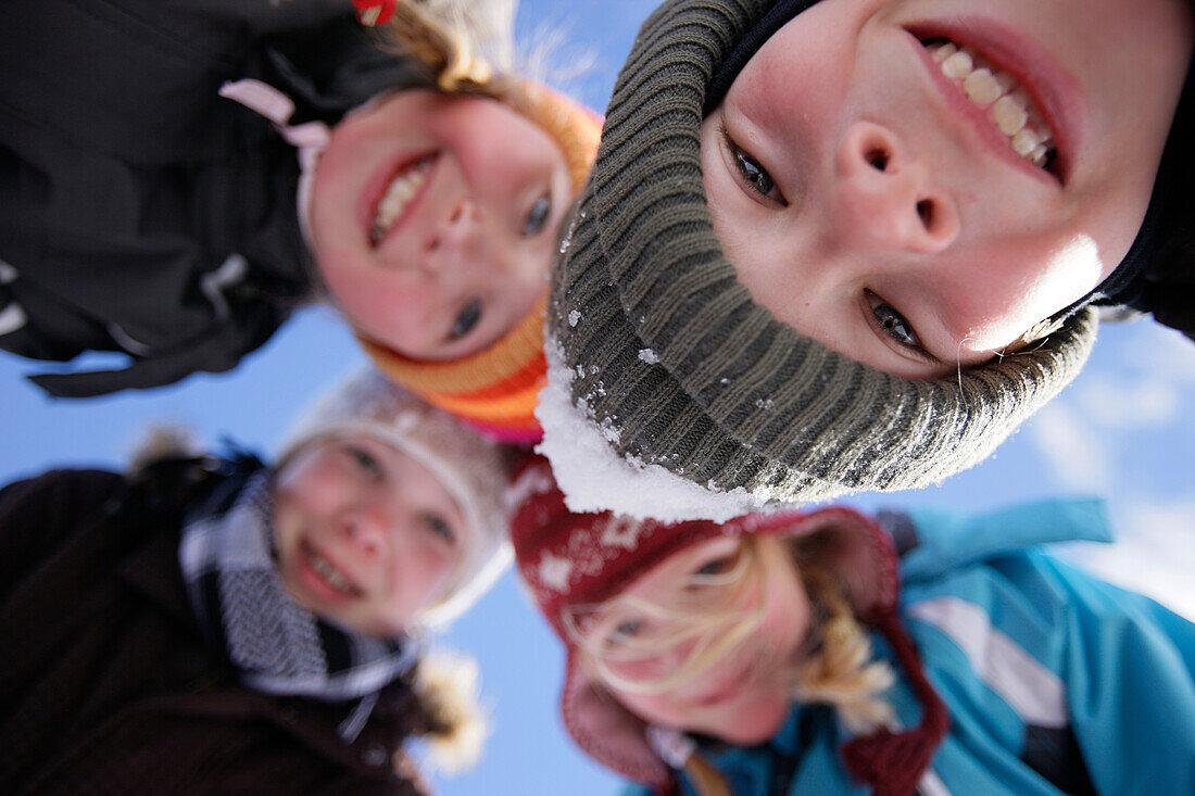 Children smiling at camera, Galtuer, Paznaun valley, Tyrol, Austria
