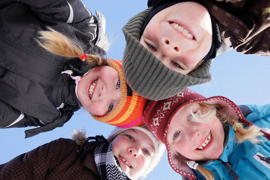 Children smiling at camera, Galtuer, Paznaun valley, Tyrol, Austria