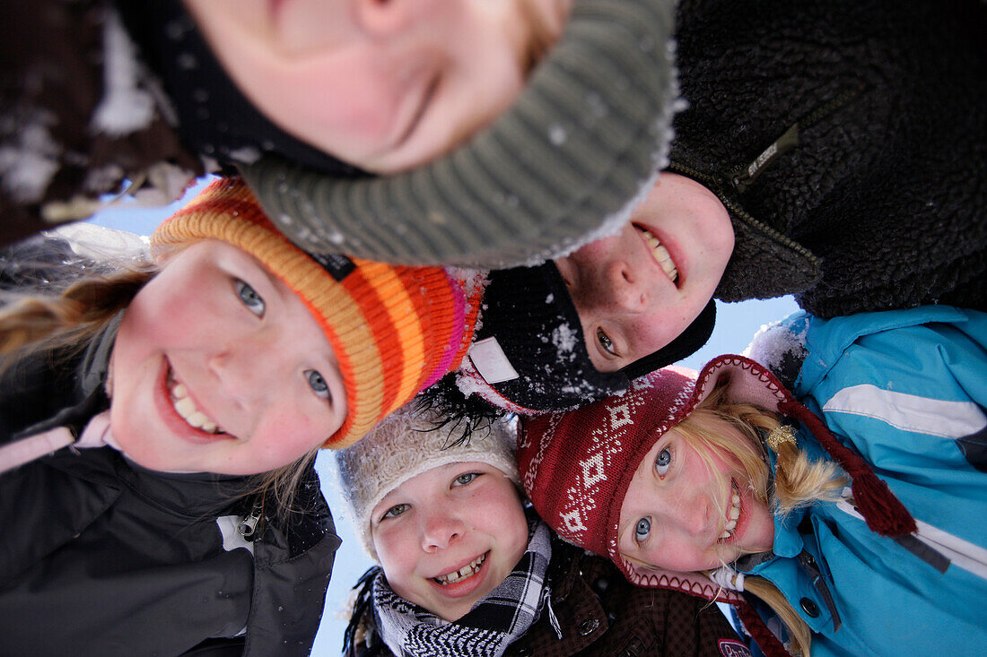 Children smiling at camera, Galtuer, Paznaun valley, Tyrol, Austria