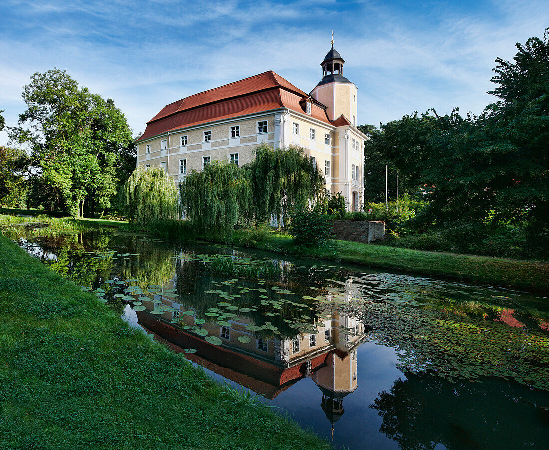 Vetschau Castle with reflection in the water, Spreewald, Land Brandenburg, Germany