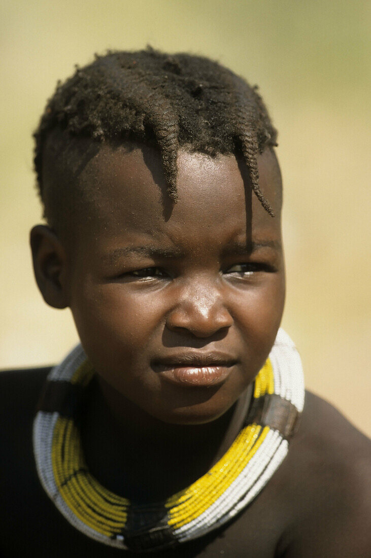 Africa, African, Afrika, Afrikaner, Baby, Black, Boy, Color, Colour, Complexion, Culture, Cultures, Embellishment, Ethnology, Himba, Himbaboy, Himbas, Hosting-junge, Human, Humans, Joung, Jung, Kaokoland, Kaokoveld, Kunene River, Namibia, Necklace, Neckla