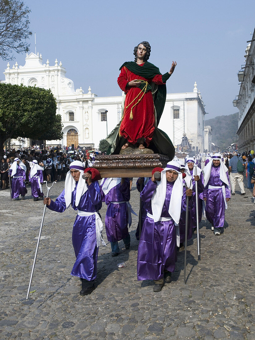 Traditionally dressed men and boys for Easter procession, Antigua, Sacatepequez, Guatemala