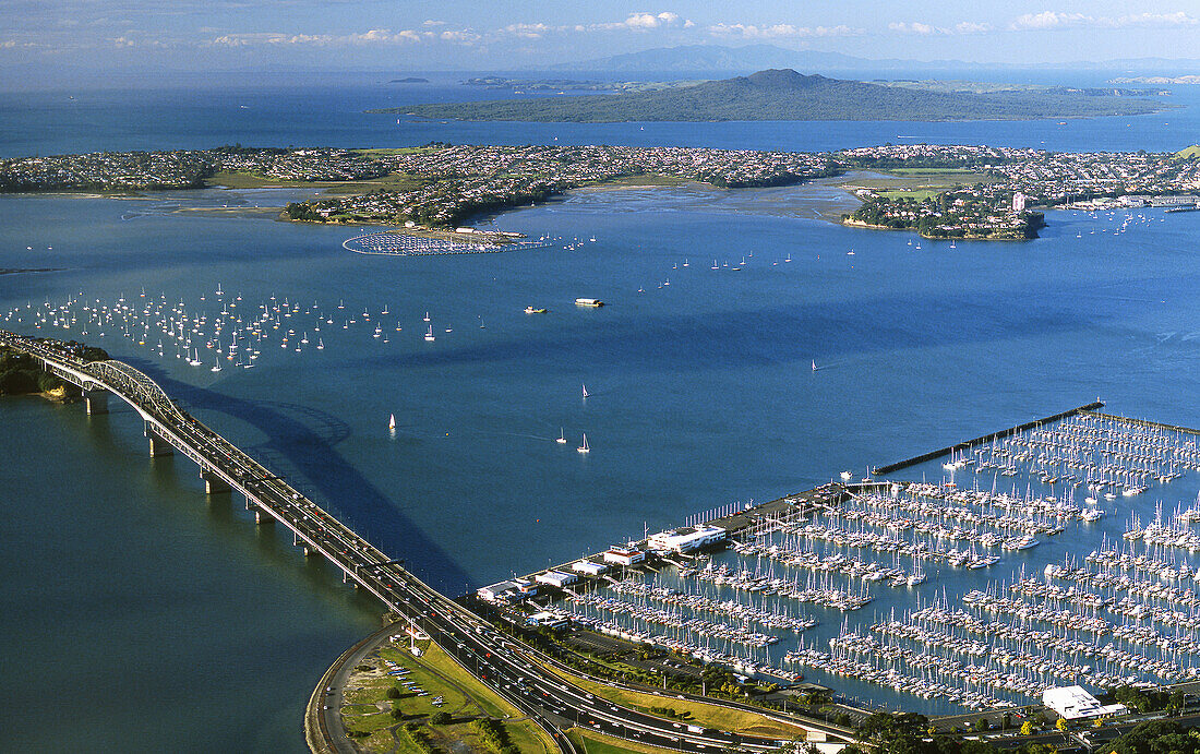 Auckland Harbour Bridge with Westhaven Marina Devonport and Rangitoto Island New Zealand