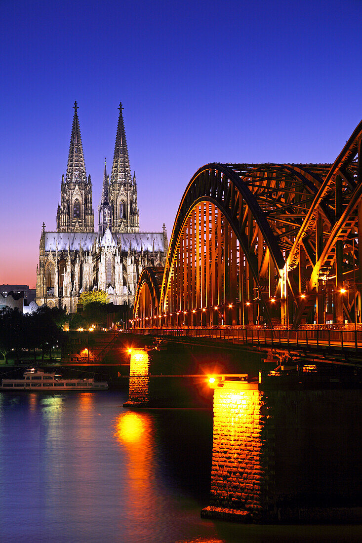 View over river Rhine towards Cologne cathedral and the Hohenzollern Bridge, Cologne, Rhine river, North Rhine-Westphalia, Germany