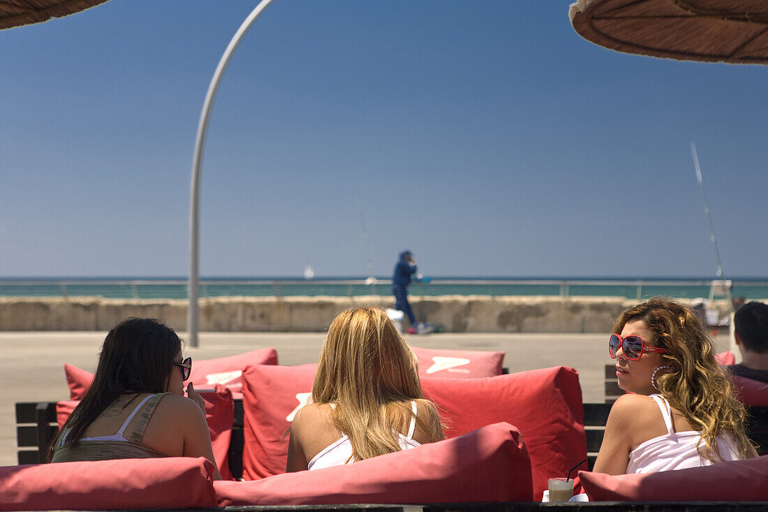 Women in a restaurant at the seaside promenade, Namal, Tel Aviv, Israel, Middle East
