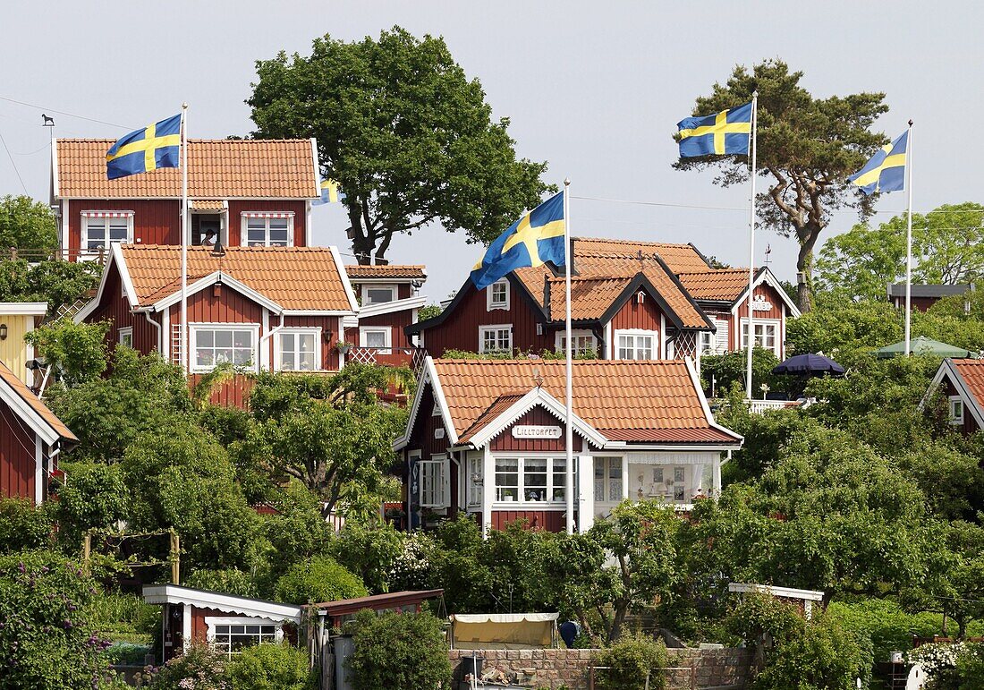 Red houses with Swedish flags, Karlskrona, Blekinge, Sweden