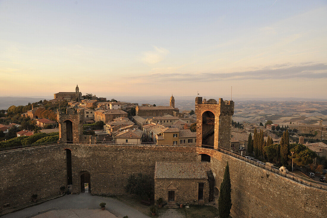 View from fortress over evening like city in autumn, Montalcino, southern Tuscany, Italy, Europe