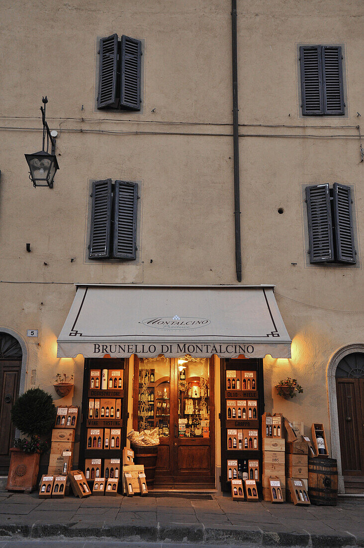 View at illuminated wine shop at Montalcino, southern Tuscany, Italy, Europe