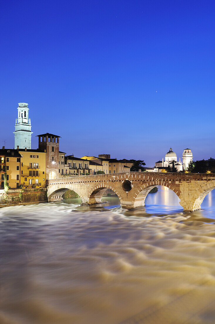 Illuminated bridge Ponte Pietra at night, UNESCO World Heritage Site, Verona, Venetia, Italy